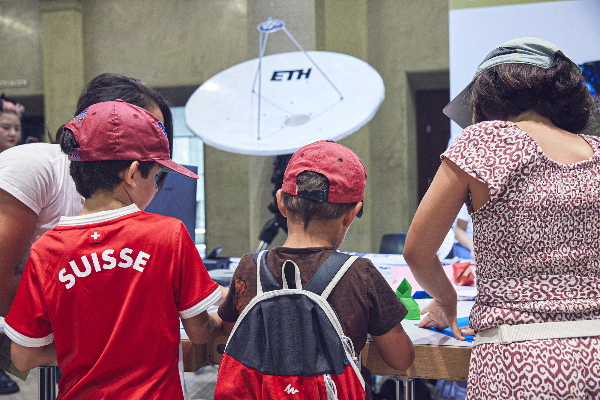 Children at the stand of the Cosmology Group