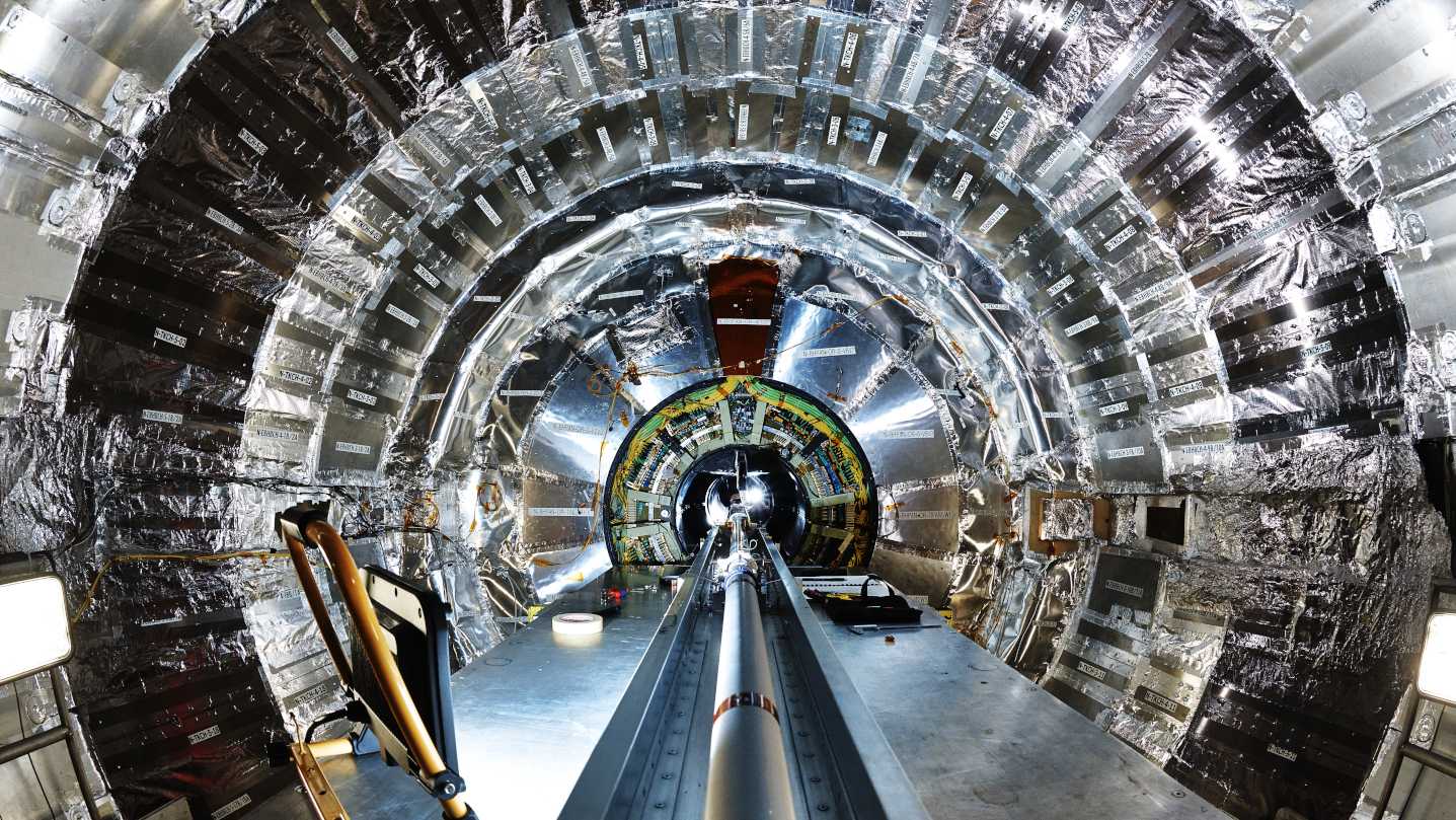 The beam pipe, the "heart" of the detector, being installed inside the CMS detector at CERN